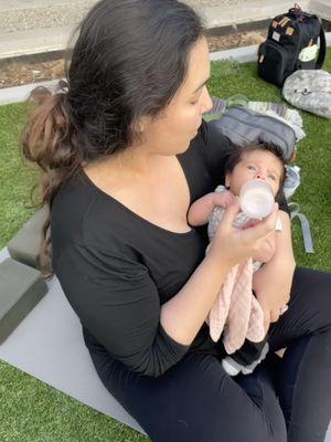 Feeding my 6 week old baby girl during an outdoor class!