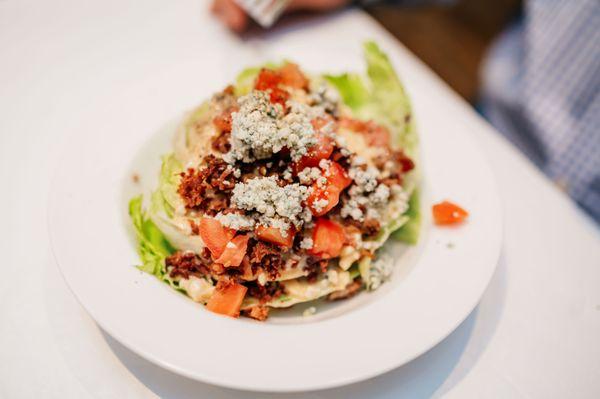 THE ICEBERG EPIC WEDGE
Crisp Iceberg Lettuce, Topped with Bacon, Tomatoes, Danish Bleu Crumbles, &
European Bleu Cheese Dressing