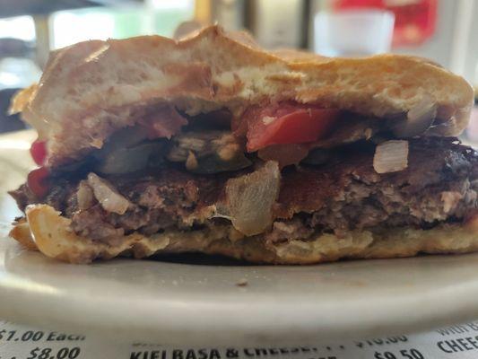 Smash-Burger, onions, tomato and peppers. Steak weight smashed burgers is crucial for that beefy caramelized exterior crust.