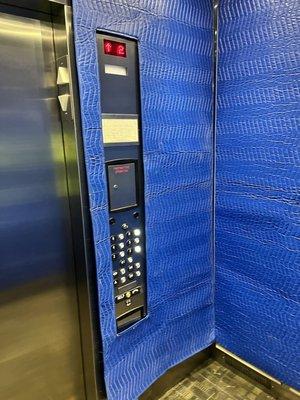 "Padded cell" elevator