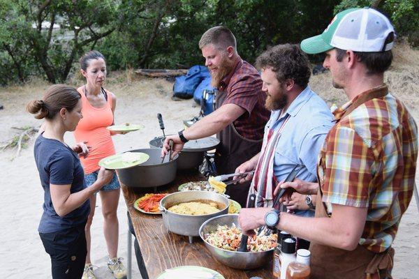 Dinner served riverside on a Hells Canyon overnight rafting trip.