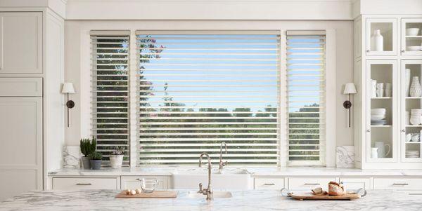 Fill your room with soft light while maintaining a sense of privacy with Silhouette® Window Shadings. Suspended between two sheers.