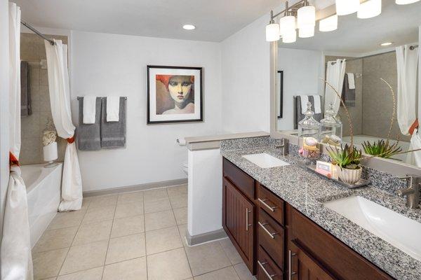 Modern bathrooms include double vanities and soaking tubs