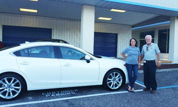 Happy client with her Mazda6 Touring!