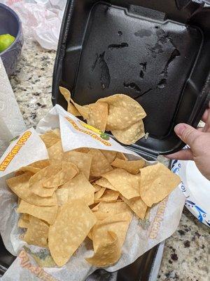 The chips were so hot and covered in oil it melted the plastic containers.