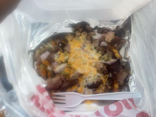 Loaded frys with chopped brisket pickles and onions SO YUMMM