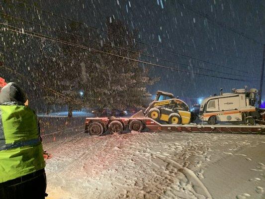 A quick winch out on a jackknifed loaded low bed on a snowy night