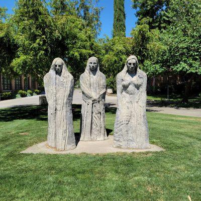 3 statues near Trinity Hall