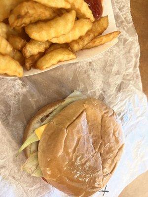 Cheese burger with fries.