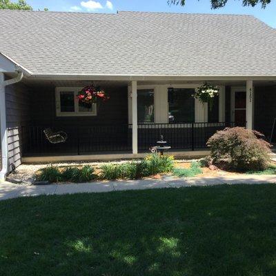 Vinyl cedar shake style siding and new windows