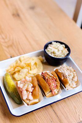 Our Luke's trio is the ULTIMATE seafood sampler. Don't forget the chips and slaw for the full experience