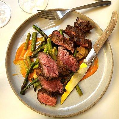 Hanger steak w truffle panisse, almond romesco, asparagus