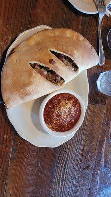 Calzone with sauce on the side