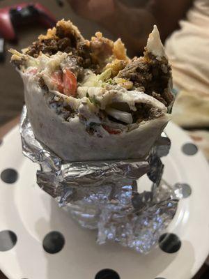 Super Steak burrito ($13.95) unwrapped and massive