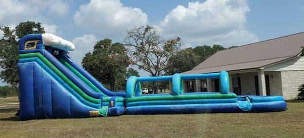 Huge 24ft Water Slide and Slip and Slide attachment for rent! Book it today while it's still available!