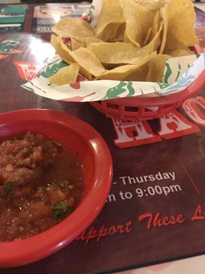 Salsa and chips. Salsa was thick and lots of garlic!  Really good.