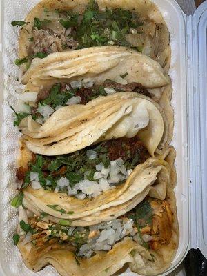 Top to bottom: Carnitas Taco, Bistec Taco, Carne Enchilada Taco, Tinga Taco