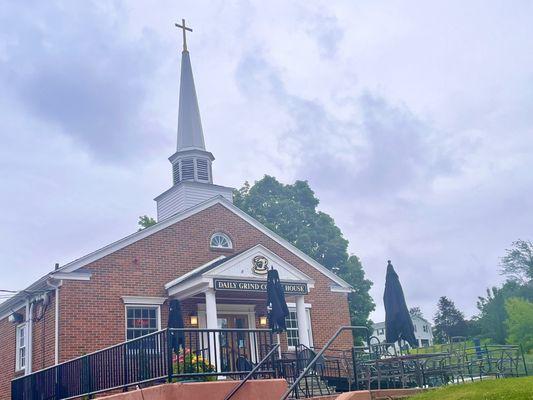 Daily grind Building, open to public, is on campus of Christ Lutheran Church located behind the coffee shop