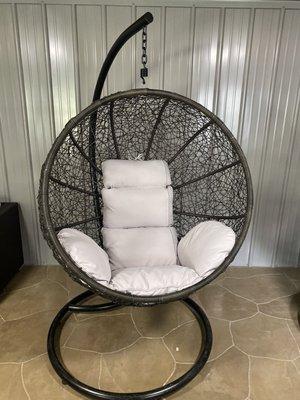 Round swing chair. Comes in either black rattan with gray cushions. Or gray rattan with white cushions.