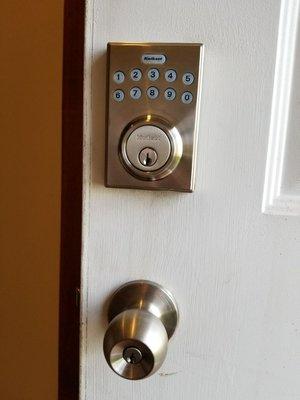 Installed a new doorknob and electronic keypad deadbolt in a law firm office in Manhattan