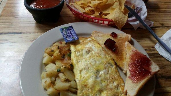 For breakfast. Spanish omelet plate. Chips & salsa.  Very good been coming since high school days.