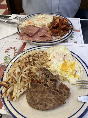 Eggs, sausage & hash browns; other is eggs, ham & home fries