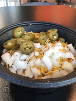 Frito chili pie (with cheese, onion, and jalapeño)