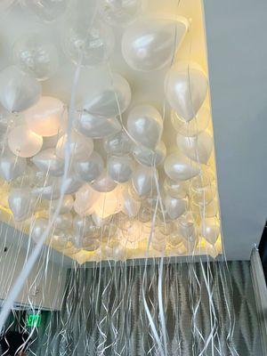 Helium balloon ceiling for wedding anniversary