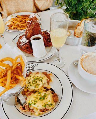 Eggs Benedict w/ Steak and Portobello Mushroom Hash and 24 hour soaked French Toast w/ Local Artisanal Sausage