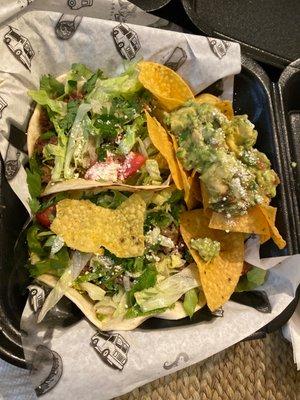 Tacos and guacamole plate