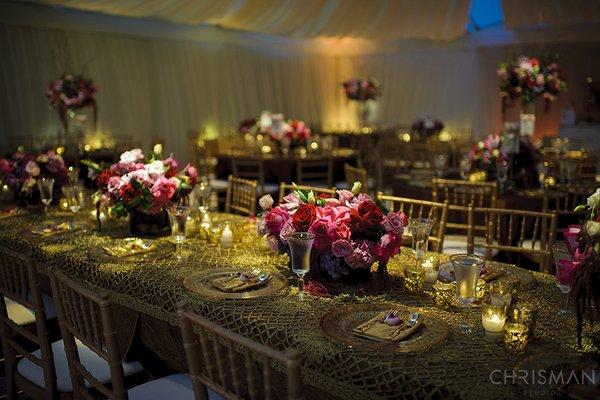 Textured linens over for guest tables.