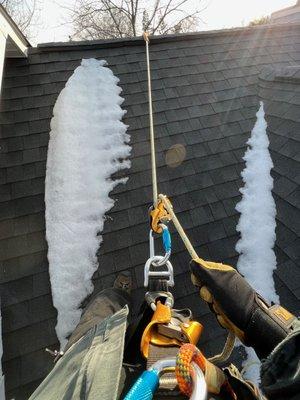 We received a call for ice damming into a nursery in a residential home. The only way to confirm it was to climb the roof.