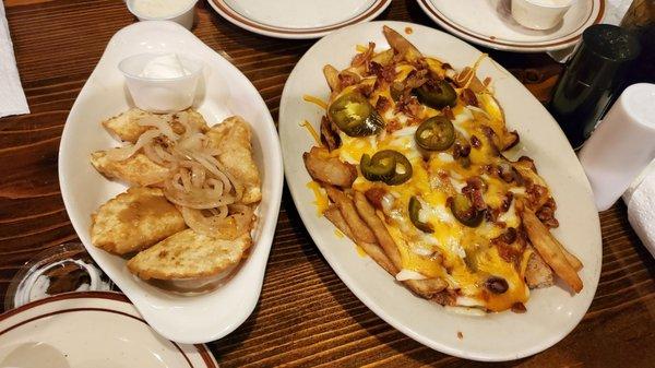 Pierogies, deep fried, topped with grilled onions Chili cheese Fries