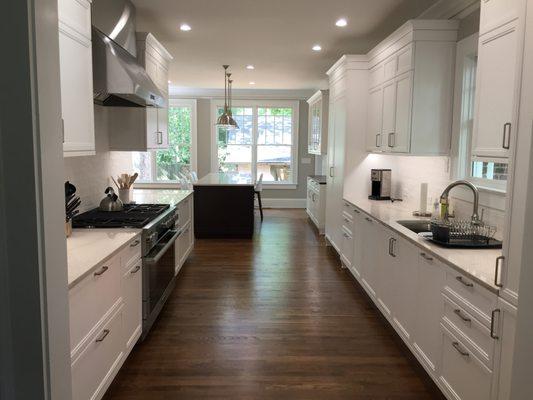 Love the cabinets and matching panels on appliances for a clean look