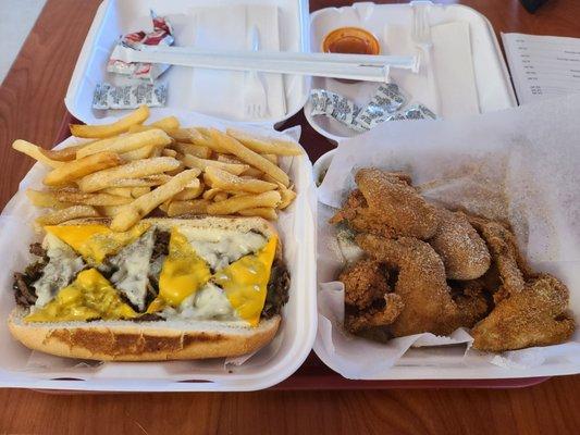 Philly Cheesesteak and chicken wings