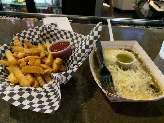 Green rolled tacos and fries