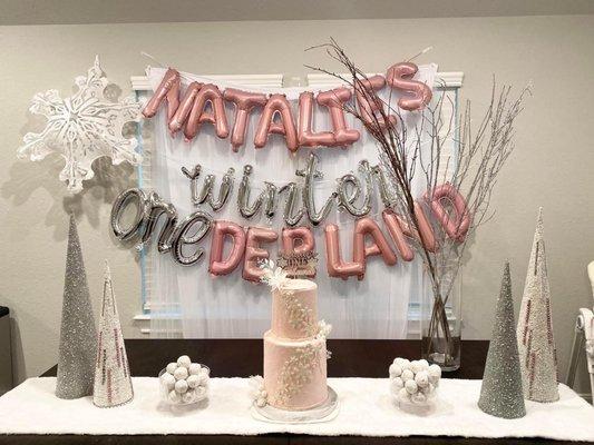 Dessert table with snowflake cake