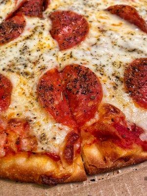 Crispy thin crust with lots of pepperonis!