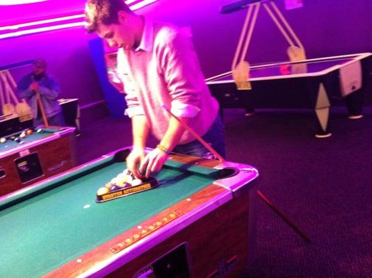 Pool table at the arcade in the mall with my friend Tom. 2015