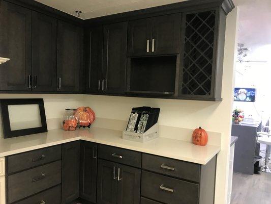 Seine Night-Shaker Cabinetry with a grey/brown color stain, Semi custom cabinets available in stock