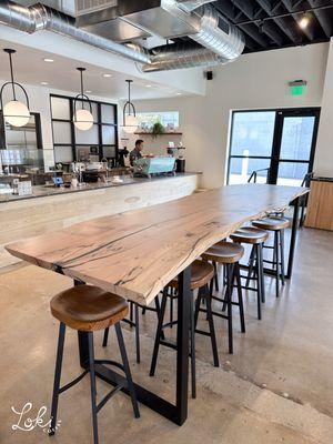 Loki Coffee Salt Lake City coffee shop tables indoor. Plenty of seating for large groups, families, and events too.