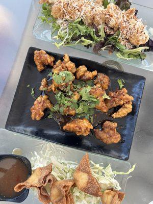 Coconut shrimp (top), general Tao's chicken, crab won tons