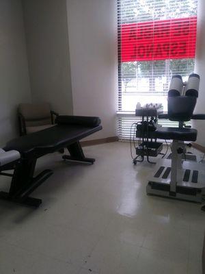 Massage chair and treatment room