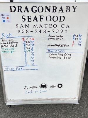 Dragon Baby Seafood Menu late in the day at the Divisadero Farmers Market San Francisco