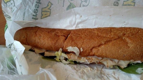 Turkey footlong with provolone cheese on wheat bread