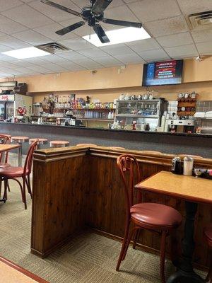 Behind the counter, the have different options for teas, cereals, coffee enhancements.