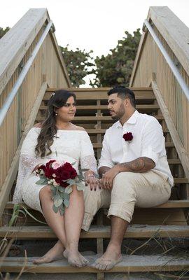 Another beautiful couple exchange vows on a local beach.