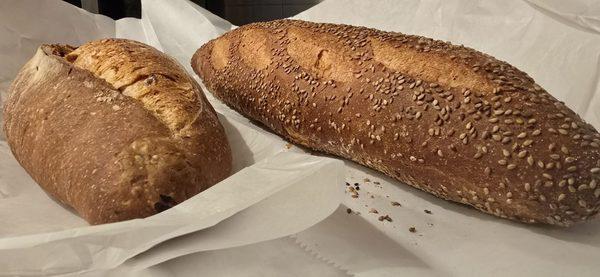 Olive bread and seeded Italian bastone