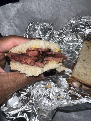 2 bites in and I'm almost done.  Pastrami Sandwich. Great taste. Crazy small portion.