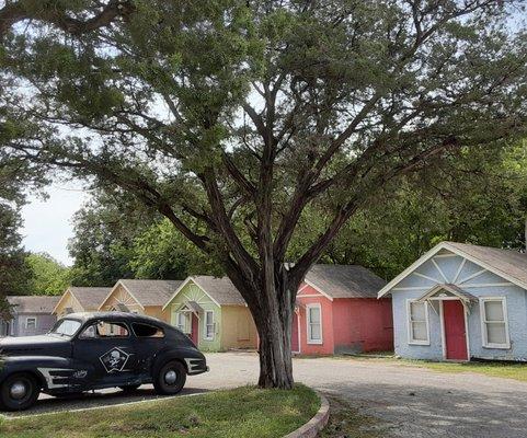 Classic car parked in our retro motor court motel. July 2020